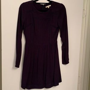 Long sleeve, navy blue dress.